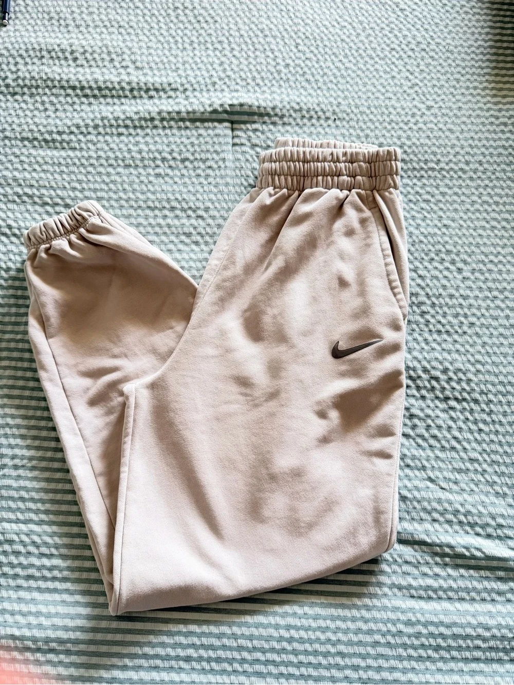 Nike Kids Light Beige Joggers with Black Swoosh